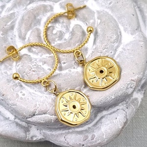 Stylish stainless steel hoop earrings with sun pendant – perfect lightness for every day