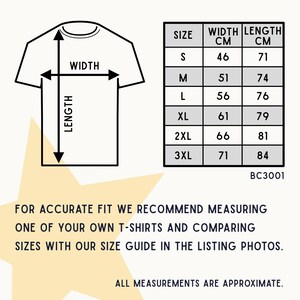May include: A white t-shirt size chart with measurements in centimeters. The chart includes sizes S to 3XL, with corresponding width and length measurements. Text at the bottom advises comparing sizes with a personal t-shirt for accurate fit.