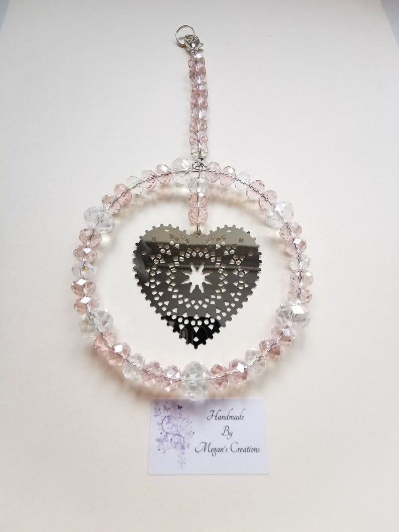 Silver coloured heart beaded suncatcher made in various colours Heart beaded suncatcher Heart suncatcher