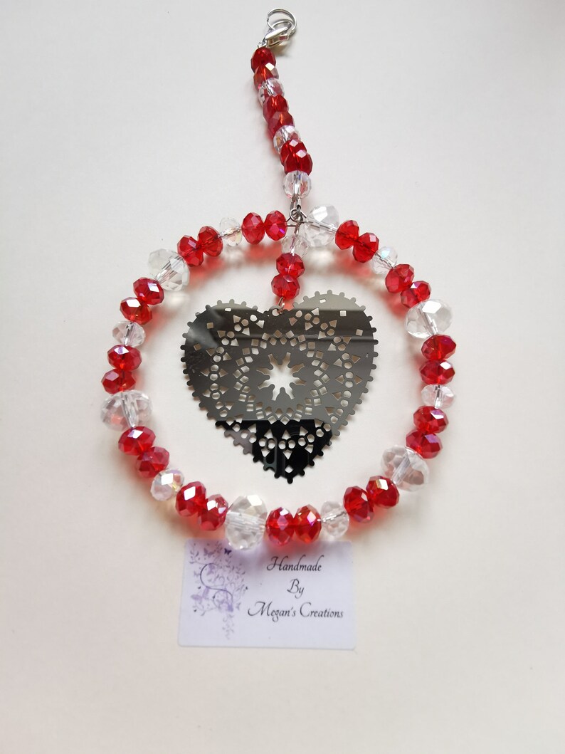 Silver coloured heart beaded suncatcher made in various colours Heart beaded suncatcher Heart suncatcher