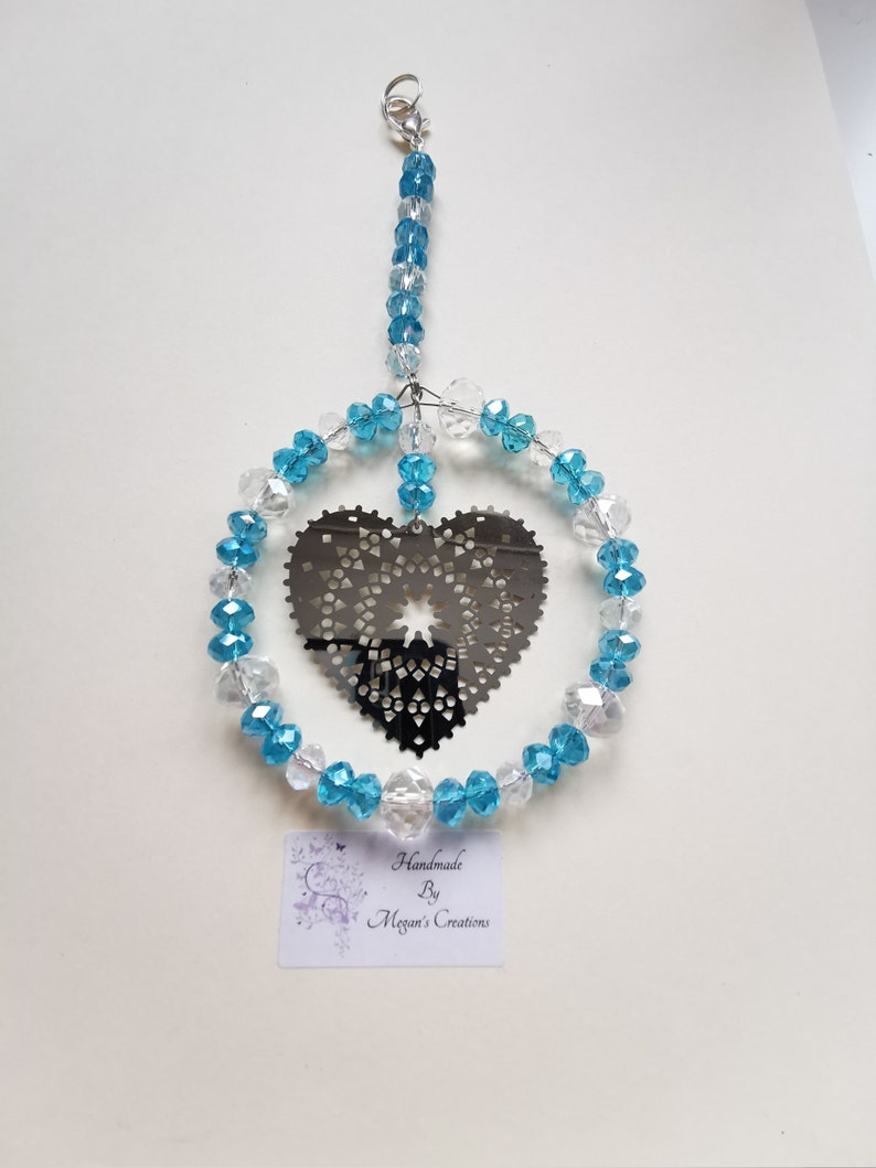 Silver coloured heart beaded suncatcher made in various colours Heart beaded suncatcher Heart suncatcher