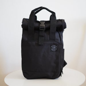 Eco-Friendly Compact Roll-Top Backpack Made from Recycled Materials | Sustainable Fashion | Recycled backpack | Rucksack | Riciclato