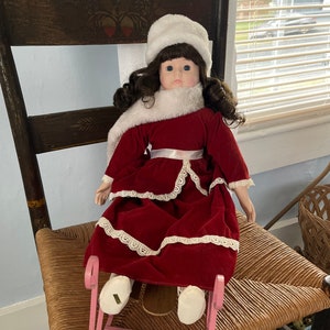Vintage 1990s Bradley Doll Collectors Choice Winter Porcelain Doll in Sleigh Collectible
