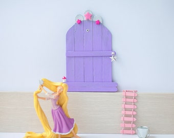 Lilac door with stars and small mushroom