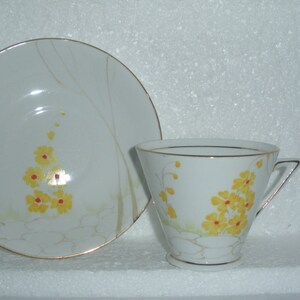Vintage Yellow and White Tea Cup and Saucer PHOENIX China