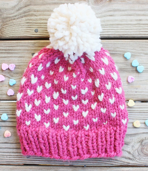 baby pink pom pom hat