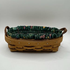 Cesta Longaberger vintage de 1997 con asas de cuero, forro y protector, 8" x 4".