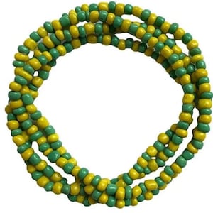 May include: A green and yellow beaded necklace. The beads are small and round, and they are strung together in a repeating pattern.