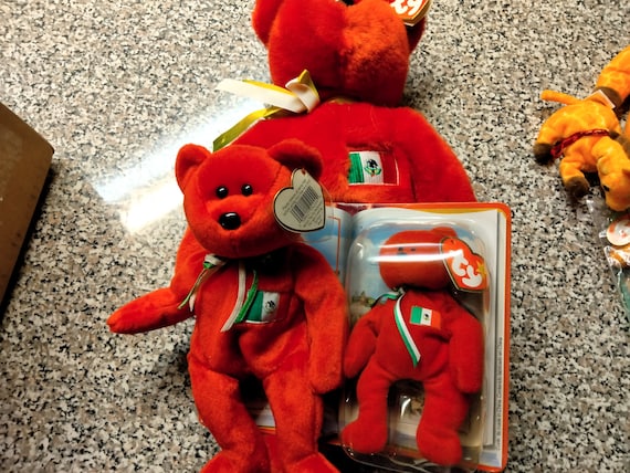 Ty Beanie Babies, McDonald's Teenies, and Buddies Osito The Red Bear With Mexican Flag On Chest (Teenie in Original McDonald's Packaging)
