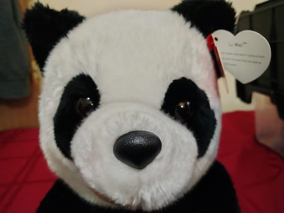 Ty Beanies Buddies LI MEI The Black And White Panda Bear Holding Green Leaves MWMT
