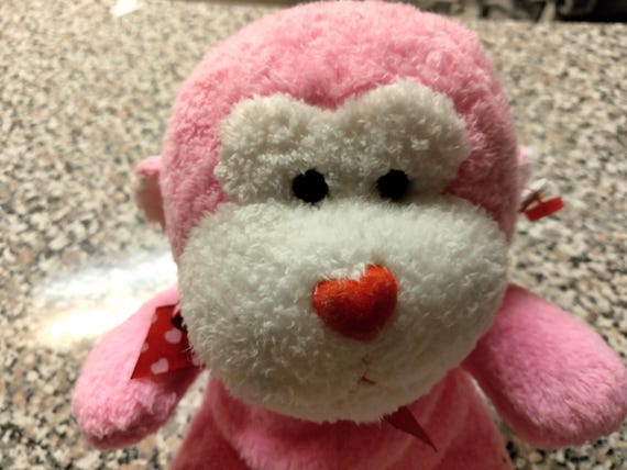 Ty Beanie Babies  Junglelove The Pink Something-or-Other ( I have no idea what this thing is) With Hearts On Feet And Heart Nose.