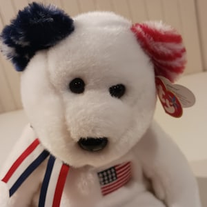 TY Beanie BUDDIES America White, With U.S. Flag On Chest, and Red, White and Blue Ribbon