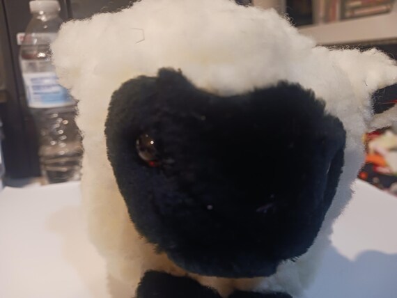 Ty beanie babies WOOLLY the White lamb sheep (slight residue on back of hangtag)