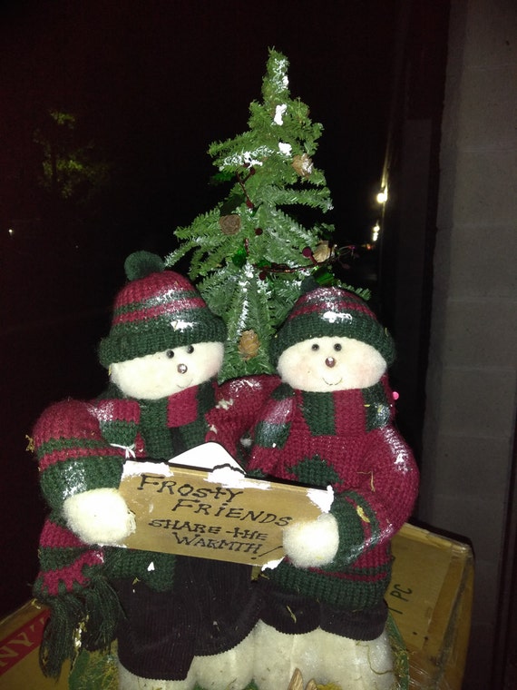Hand-Made Christmas Centerpiece: Children singing Christmas songs underneath a tree