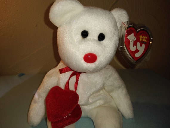 Ty beanie babies Truly the Love Bear with Fabric Hearts around his neck.