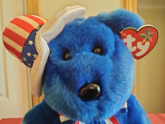 Ty Beanie BUDDIES Sam Blue With Stars And Stripes Hat, And Red White And Blue Ribbon