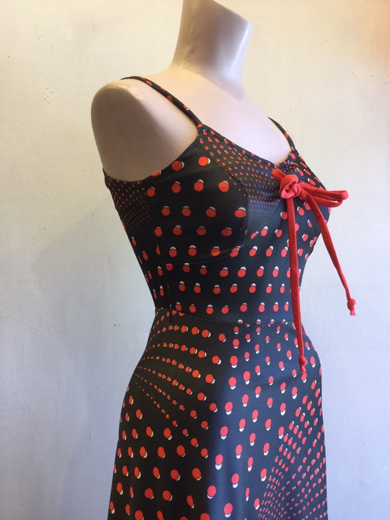red polka dot tank