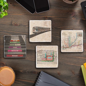 May include: Set of four coasters featuring vintage Chicago transit designs. The coasters are made of stone and feature a map of the Loop district, a train, and a graphic of the CTA's elevated train lines.