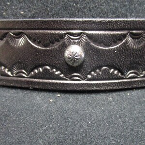Hand Tooled Leather Hat Band with Nickel Plated Engraved Dome Spots.