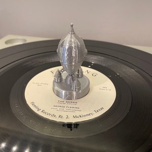 Vintage Rocket 45 rpm record adapter