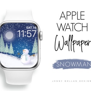 Peut inclure: Un cadran de montre Apple blanc avec une scène hivernale représentant un bonhomme de neige, des arbres et de la neige qui tombe. L'heure est affichée à 11h57 et la date est SAM 16. Le texte "APPLE WATCH Wallpaper SNOWMAN" est affiché sous le cadran de la montre.