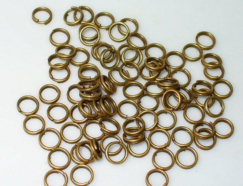 100 Cleavage rings 5 mm bronze 45.5
