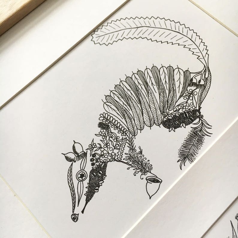 May include: A black and white line drawing of an animal, possibly a possum, made entirely of leaves and flowers. The animal is depicted in a curled up position.