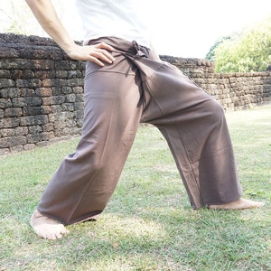 May include: A pair of brown pants with a wrap-around style. The pants are made of a soft, comfortable fabric and have a relaxed fit.