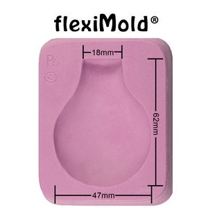May include: A pink silicone mold for making a pear-shaped object. The mold is 6.2 inches tall, 4.7 inches wide, and 1.8 inches deep. The mold is labeled "P6" and "flexiMold".