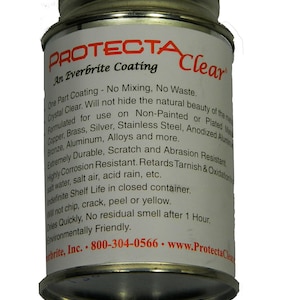 May include: A silver can of ProtectAClear Everbrite Coating. The label is white with red and black text. The text reads: "One Part Coating - No Mixing, No Waste. Crystal Clear. Will not hide the natural beauty of the metal. Formulated for use on Non-Painted or Plated Metal. Copper, Brass, Silver, Stainless Steel, Anodized Aluminum, Bronze, Aluminum, Alloys and more. Extremely Durable, Scratch and Abrasion Resistant. Highly Corrosion Resistant. Retards Tarnish & Oxidation. salt water, salt air, acid rain, etc. Indefinite Shelf Life in closed container. Will not chip, crack, peel or yellow. Dries Quickly. No residual smell after 1 Hour. Environmentally Friendly. erbrite, Inc. 800-304-0566. www.ProtectaClean"