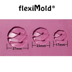 May include: Three pink silicone moulds for making resin crafts. The moulds are shaped like a circle with a wavy design. The moulds measure 27 mm, 23 mm, and 17 mm in diameter.