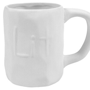 May include: White ceramic mug with the word "Lit" embossed on the front.