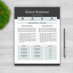 May include: A black and white CV template with a grey background. The CV is for Karen Seastone, Project Manager. The CV includes contact information, work experience, awards, achievements, and interests.