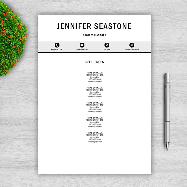 May include: A professional resume template with the name "JENNIFER SEASTONE" and the title "PROJECT MANAGER" at the top. The resume includes contact information and a section for references. A silver pen rests on the right side of the document.