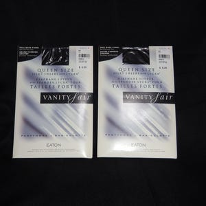 May include: Two packages of Vanity Fair Queen Size silky sheer pantyhose with Lycra. The packaging is white with a gradient purple and blue design. Text includes "Diaphane Soyeux" and "Tailles Fortes".