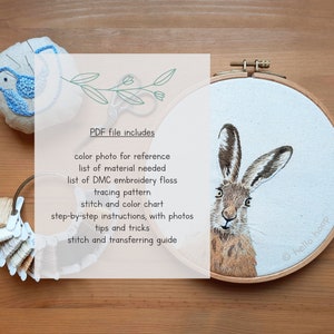 May include: A PDF pattern for embroidery featuring a brown hare in a wooden embroidery hoop. The PDF includes a color photo for reference, a list of materials needed, a list of DMC embroidery floss, a tracing pattern, a stitch and color chart, step-by-step instructions with photos, tips and tricks, and a stitch and transferring guide.