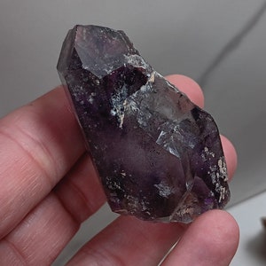 Brandberg amethyst crystal with red hematite and chlorite inclusions Namibia z51