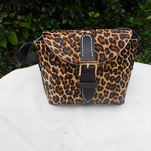 Leopard Imprinted Hair on Cowhide Bucket Bag