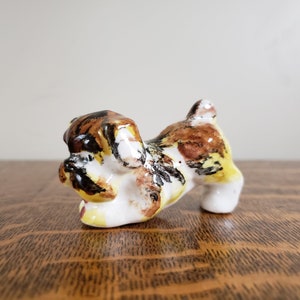 Playful Dog Porcelain Figurine