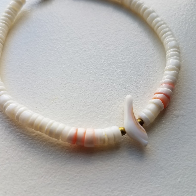 Shell Bracelet with Bird Bead