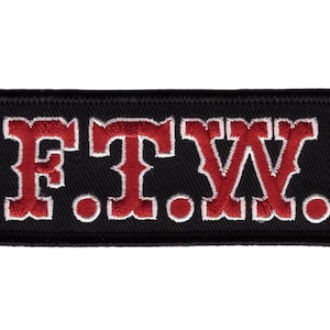 May include: Black embroidered patch with the letters "FTW" in red with white outlines.