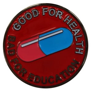May include: A red and blue pill with the text "Good for health, bad for education" around the edge. The pill is a popular symbol from the film "The Matrix".