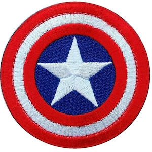 Peut inclure: Un patch brodé rouge, blanc et bleu avec une étoile blanche sur un cercle bleu entouré d'un cercle rouge et blanc.