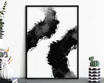 Op de afbeelding: Zwart-witte abstracte kunstprint met twee grote penseelstreken in een moderne stijl. De print is ingelijst in een zwart frame.