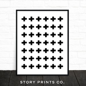 May include: Black and white printable art print featuring a repeating pattern of plus signs. The print has a white background and black plus signs. The print is framed in a black frame and has the text "STORY PRINTS CO." at the bottom.