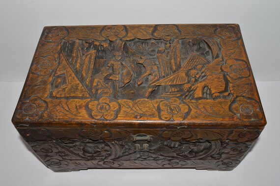 Antique carved 2024 wooden chest