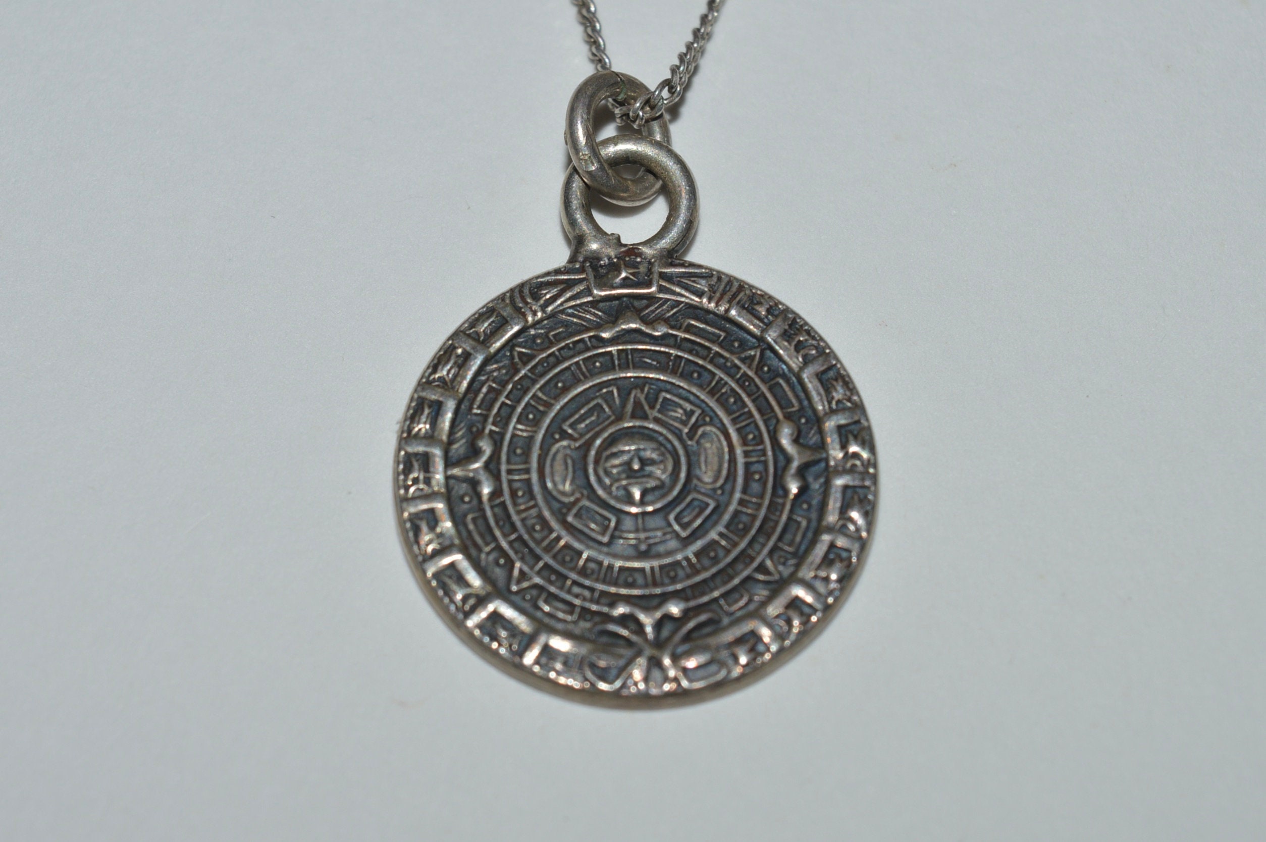 Silver mayan shop calendar pendant