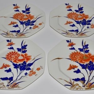 May include: A rustic wooden sign with the text "Welcome to our home" in white lettering. The sign features a distressed finish and a simple, inviting design, perfect for entryway decor.