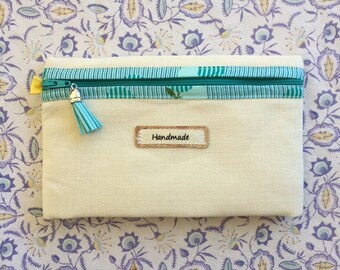 Aqua Cross Stitch Zippered Accessory Bag. Linen - lined with floral striped fabric. Fits small scissors, stitch markers, small tools.
