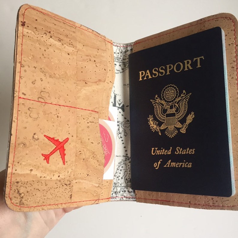 Wrap your passport in this durable cork case Natural Cork Passport Travel Wallet Embroidered Compass Rose with credit card pockets